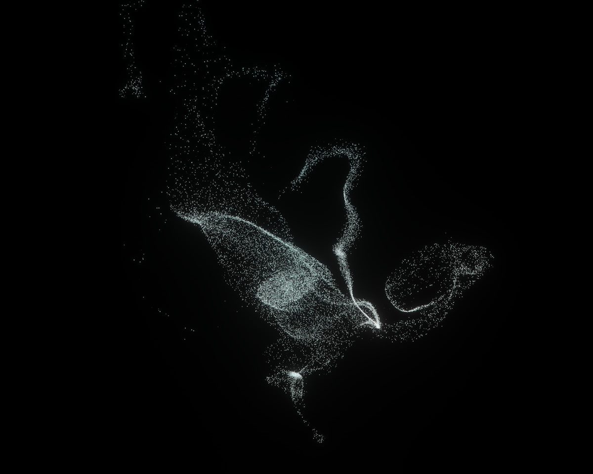 An image of particles on a dark background reminiscent of generative synthetic data.