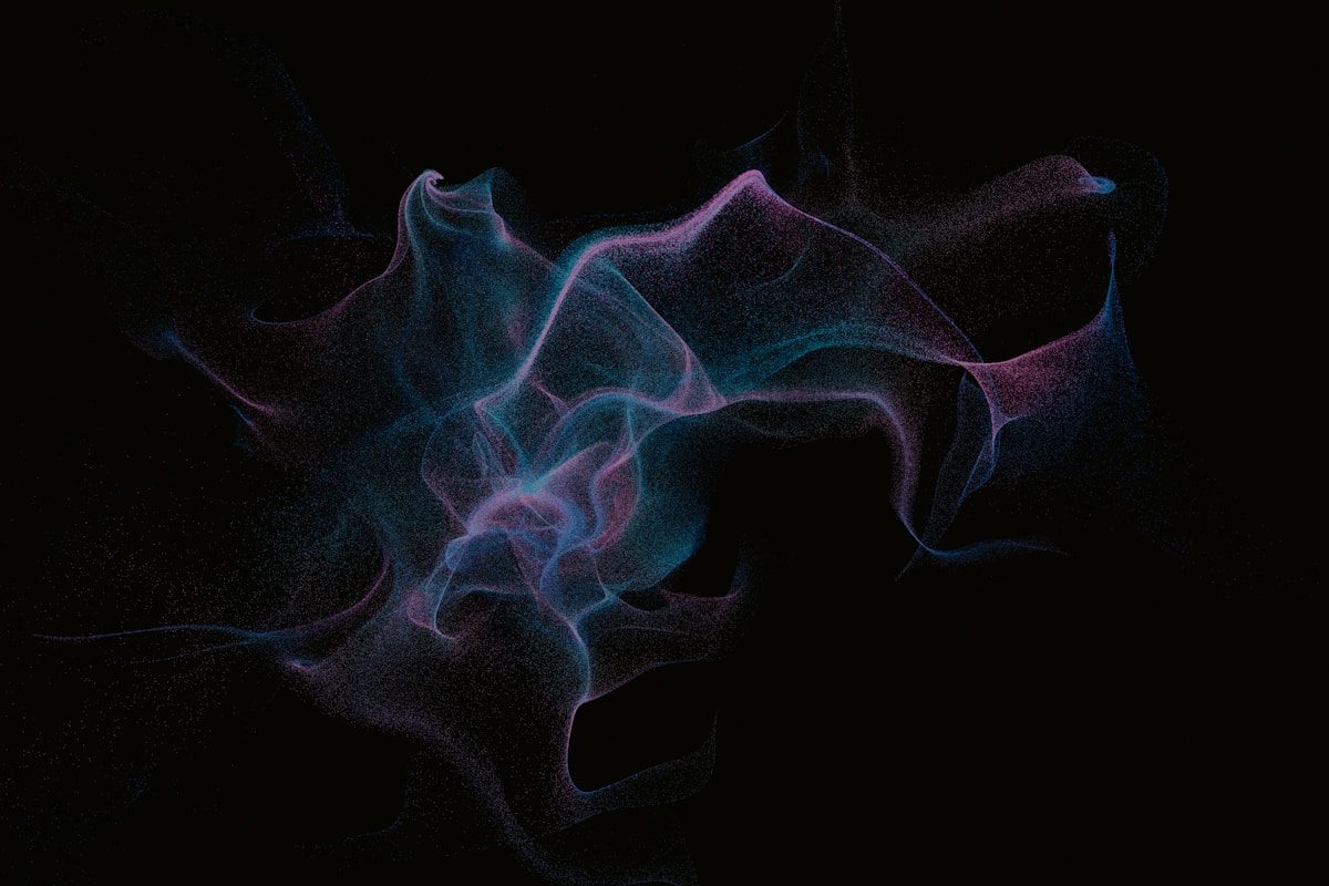 An image of purple and blue particles on a dark background conjuring data for watermarking.